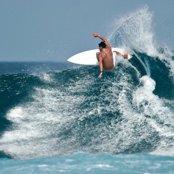 Surfer Riding A Wave | Hot Water 2Day